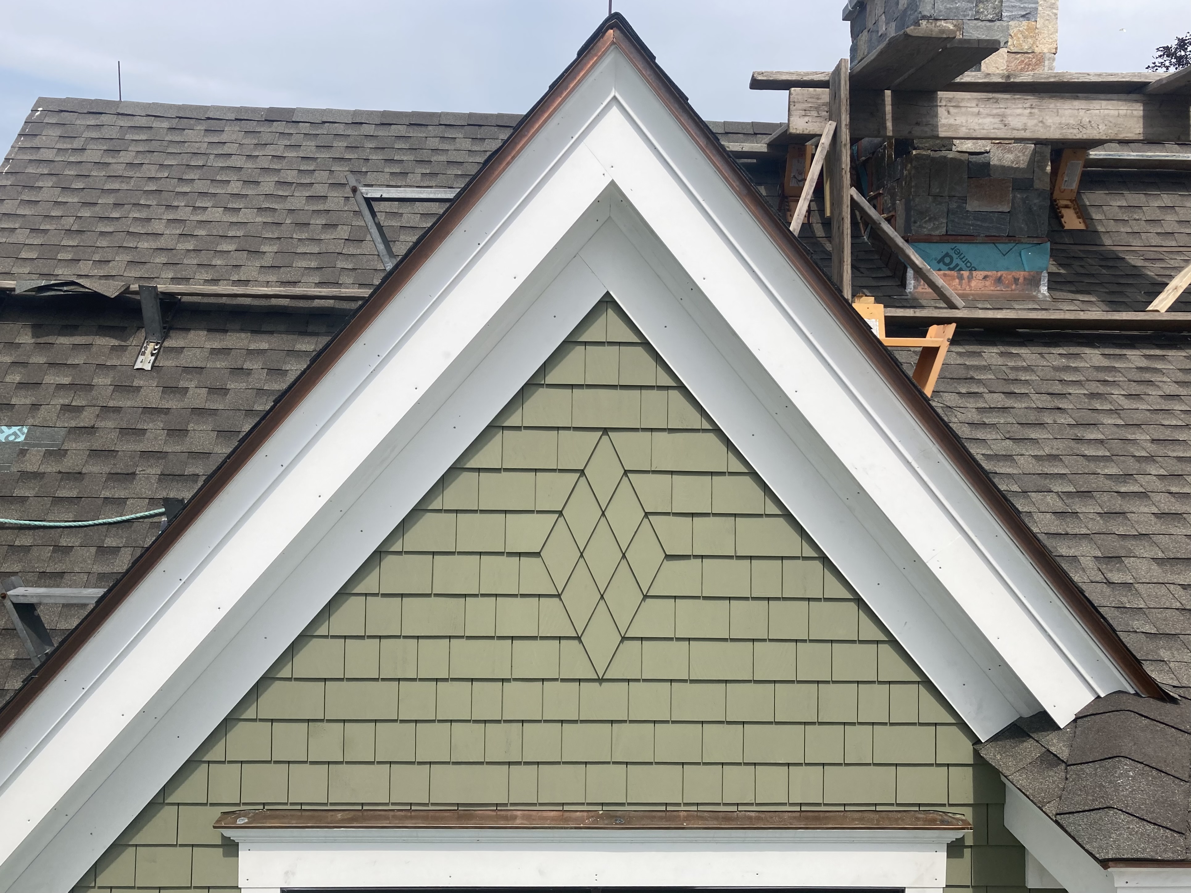 Exterior siding and trim installation by MD Builders & Development on a North Shore home